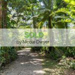 SECLUDED RAINFOREST PARADISE, WITH CREEK ON 1 HA – SELLING AS IS